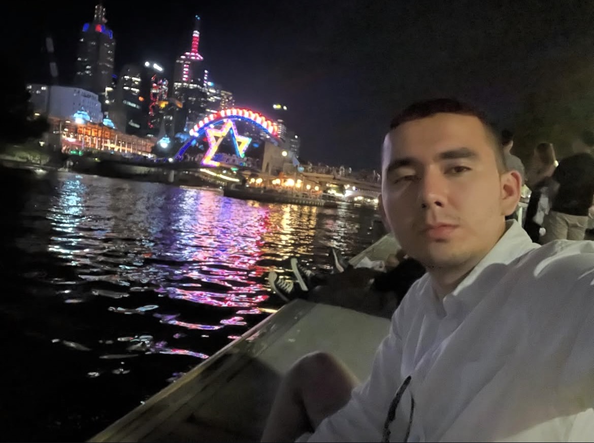 Hamidreza by the Melbourne riverfront at night